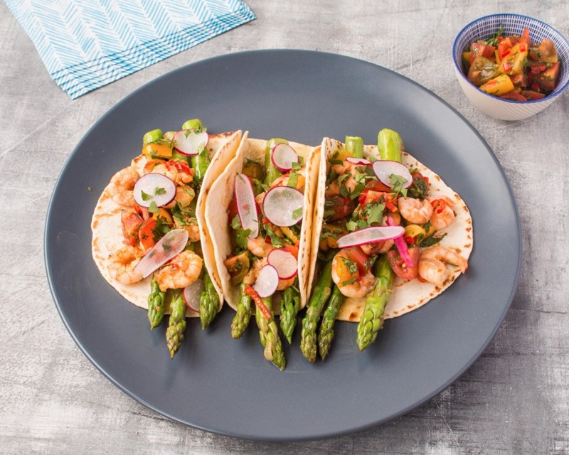British asparagus and prawn tacos with a tomato salsa